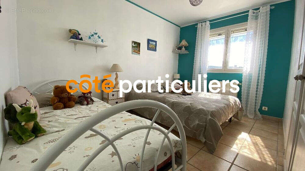 Maison à SAINT-JULIEN-LES-ROSIERS