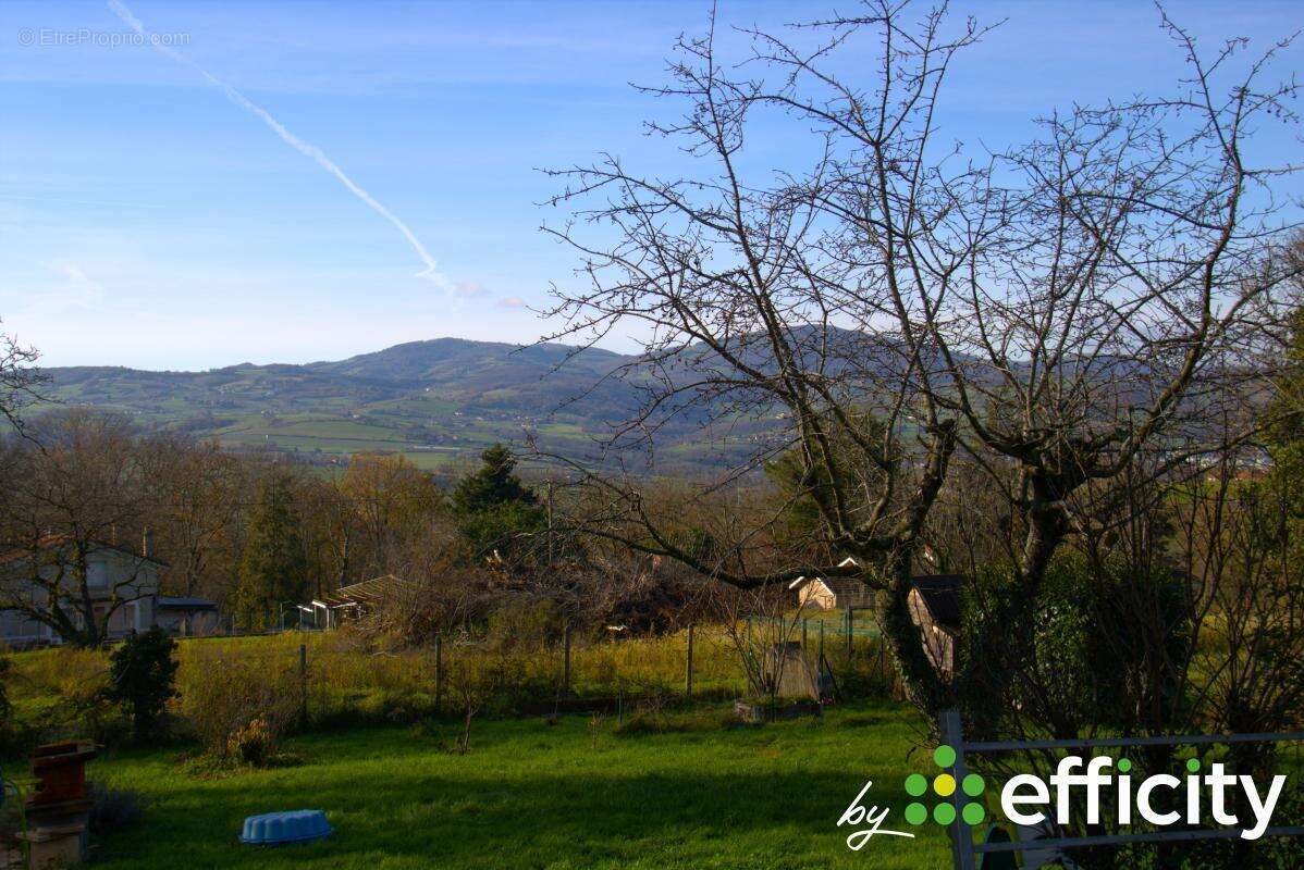 Maison à SOURCIEUX-LES-MINES