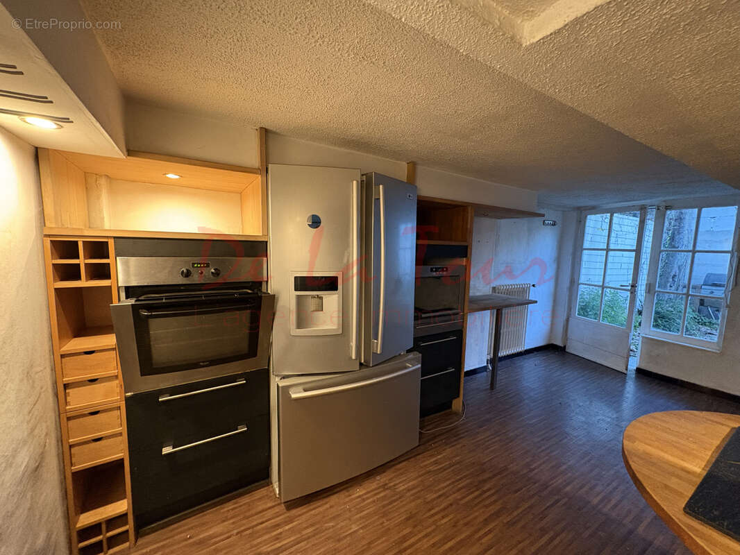 Immeuble avec commerce superficie totale 100m2 - photo 2
