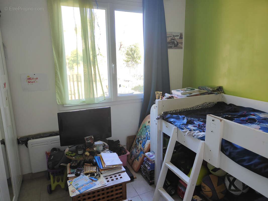 Maison de plain-pied de 76,22 m2 et un mazet - photo 6