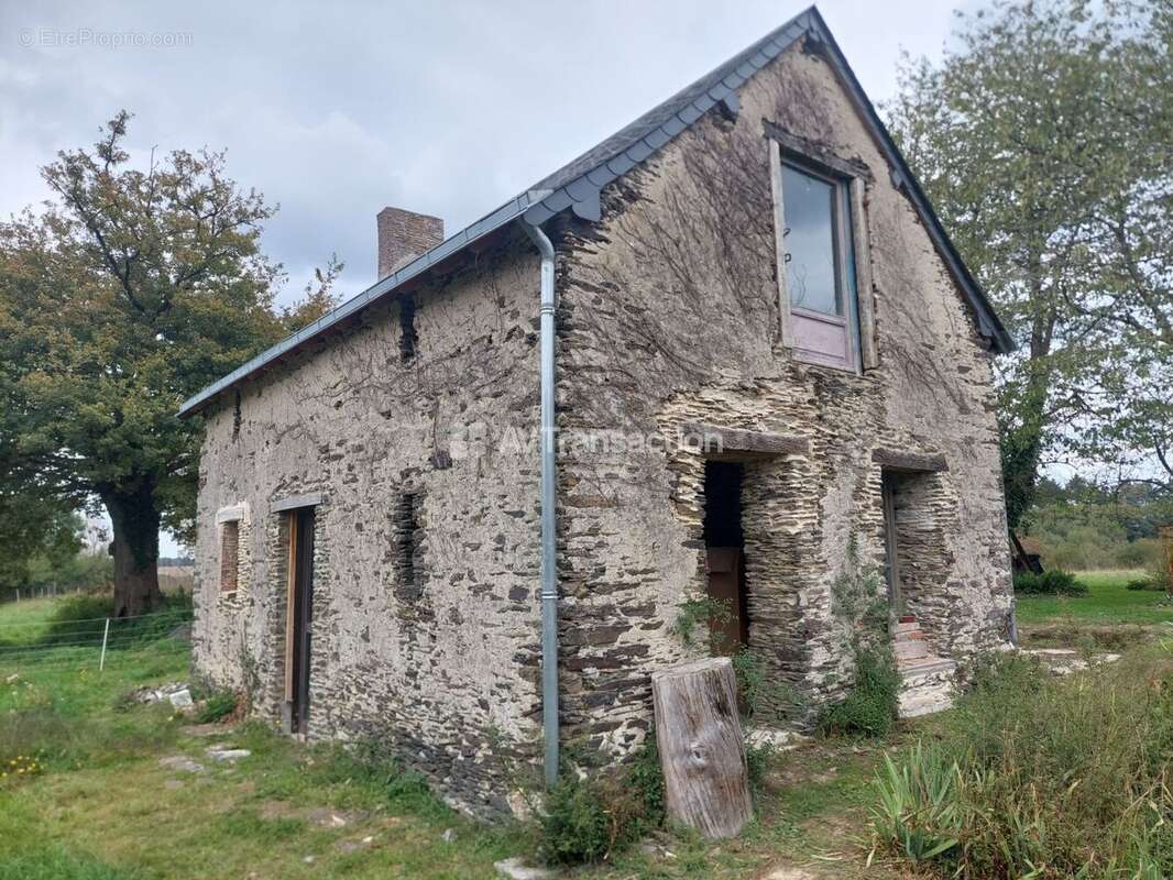Maison à LOUVIGNE