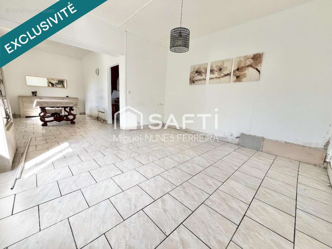 Photo 2 - Maison à SAINT-ETIENNE-DU-ROUVRAY