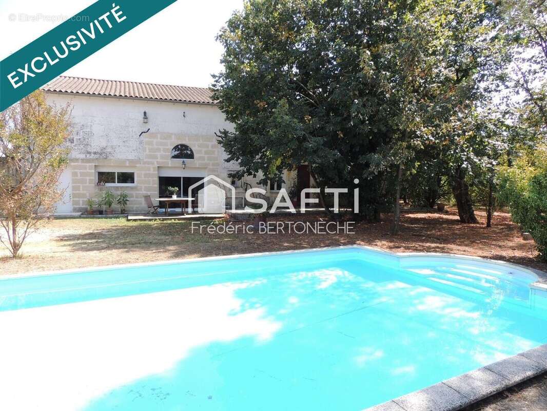 Photo 2 - Maison à COUTRAS