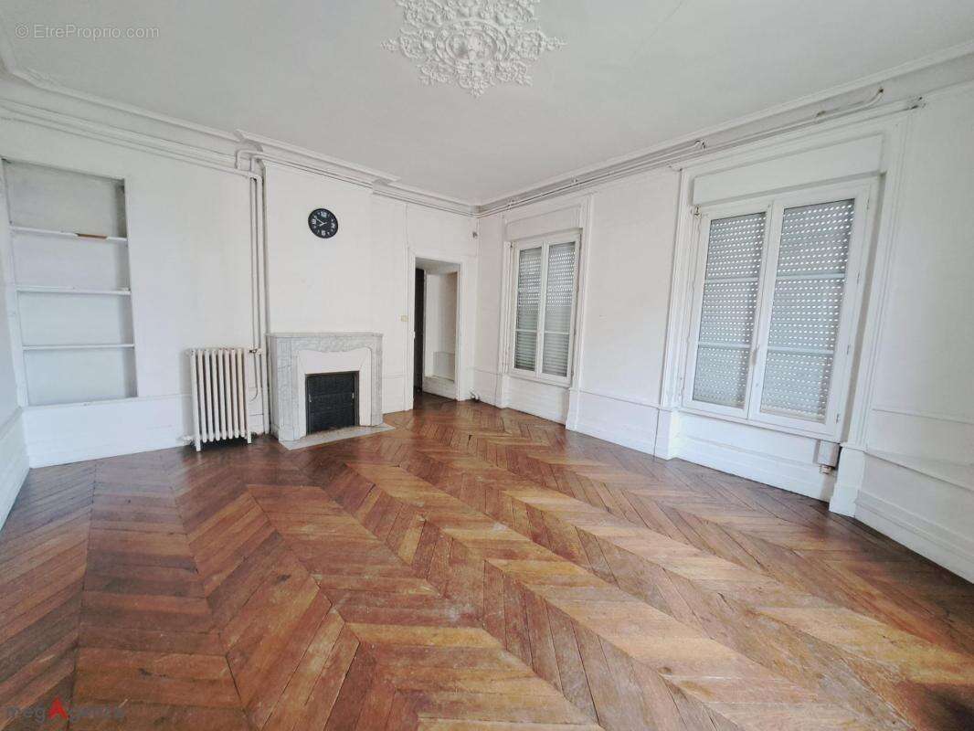 Immeuble 265m² compsé de 4 lots avec jardin - photo 5