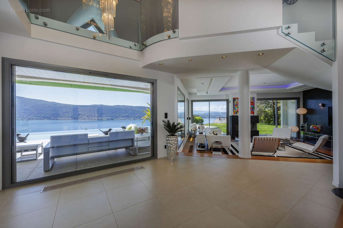Villa d'exception dominant le lac - photo 39