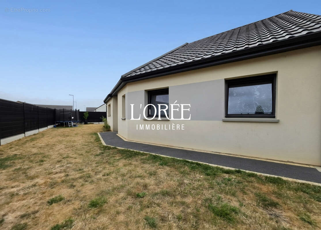 Plain pied individuel - construction recente - 3 chambres -  veranda  - jardin - photo 11
