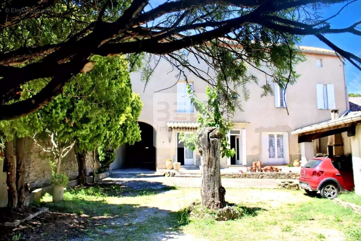 Maison à LAUDUN-L&#039;ARDOISE