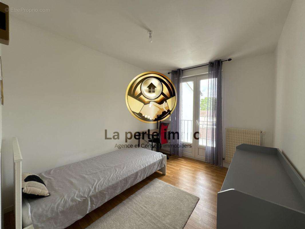 Maison 6 pièces 98 m² avec 4 chambres à Reims 51100 - photo 11