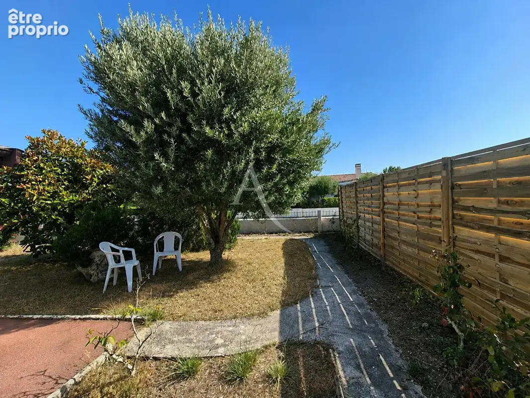 GRADIGNAN - Maison plain pied 5 pièce(s) 115 m² - photo 5