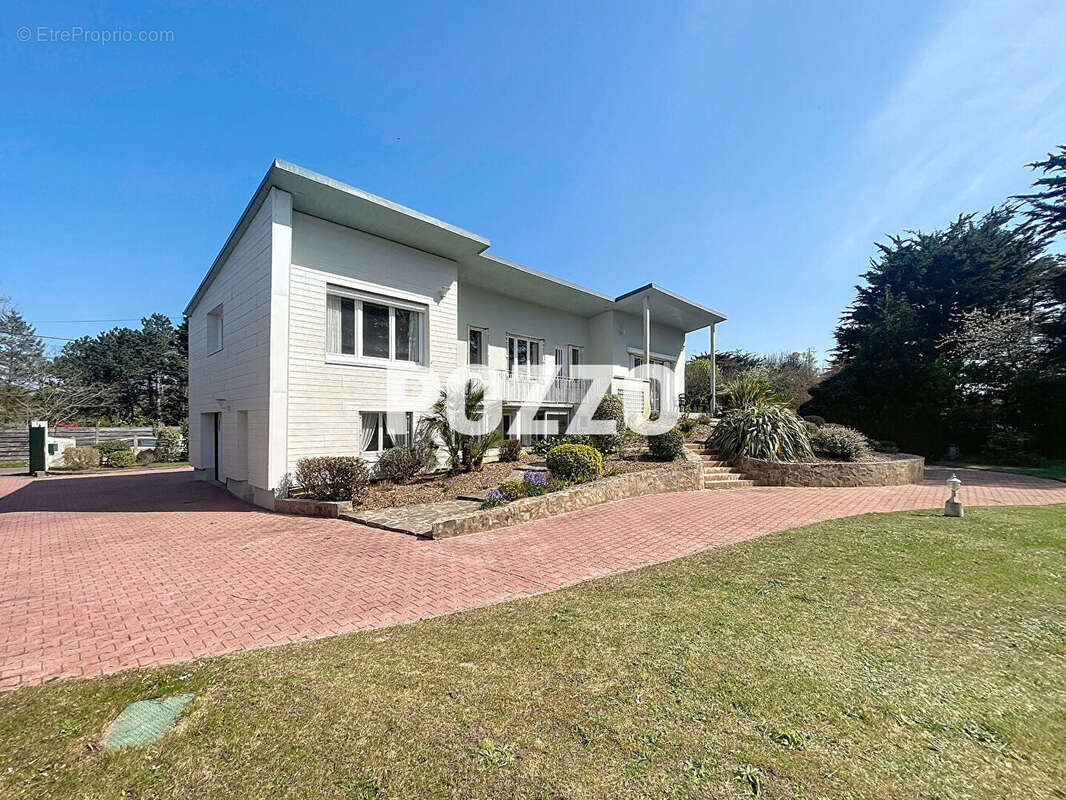 Maison à AGON-COUTAINVILLE