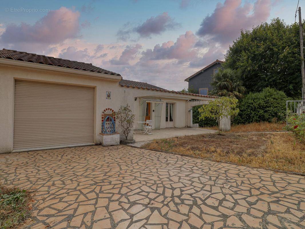 Maison de plain-pied de 110 m² - 3 chambres - Garage - Véranda -Terrain de 682 m² - photo 1