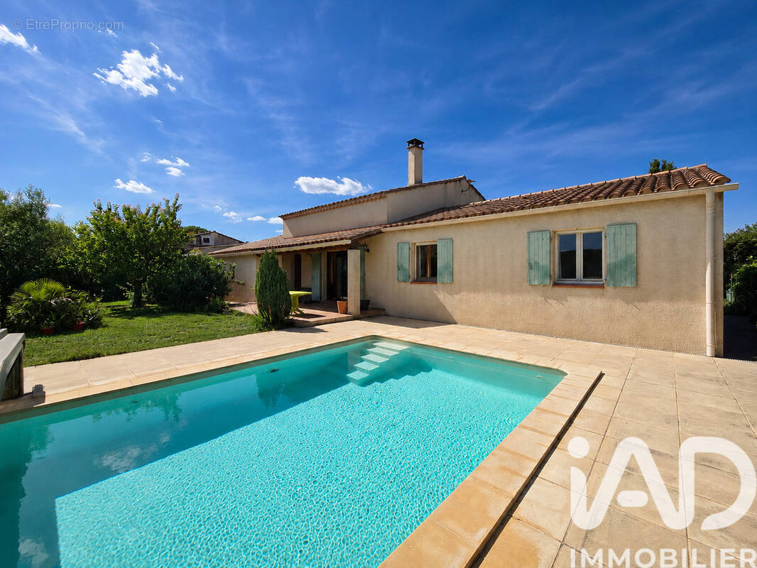 Photo 1 - Maison à LAUDUN-L'ARDOISE