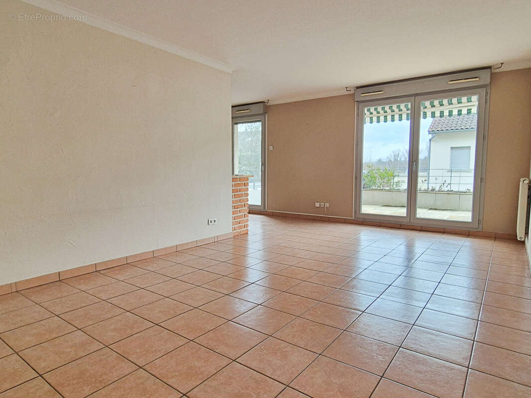 Appartement à FONTAINES-SUR-SAONE