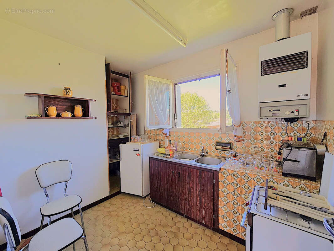 Maison avec T1 bis  indépendant à louer et jardin - photo 12