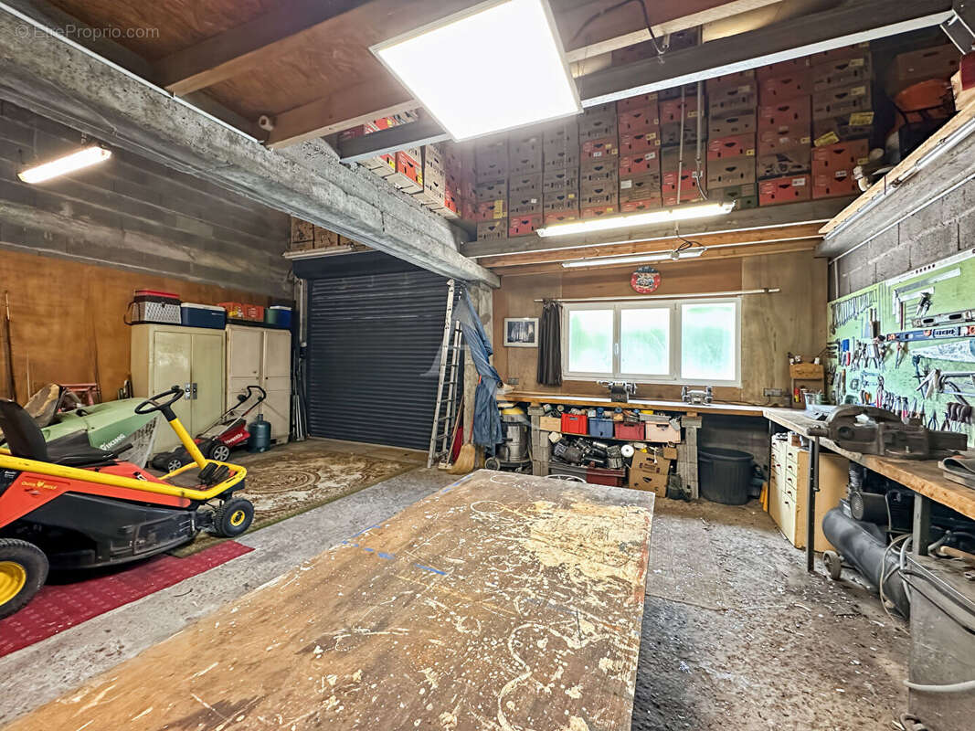 Maison 133m² habitables + 130m² de garages + studio et étang - photo 12