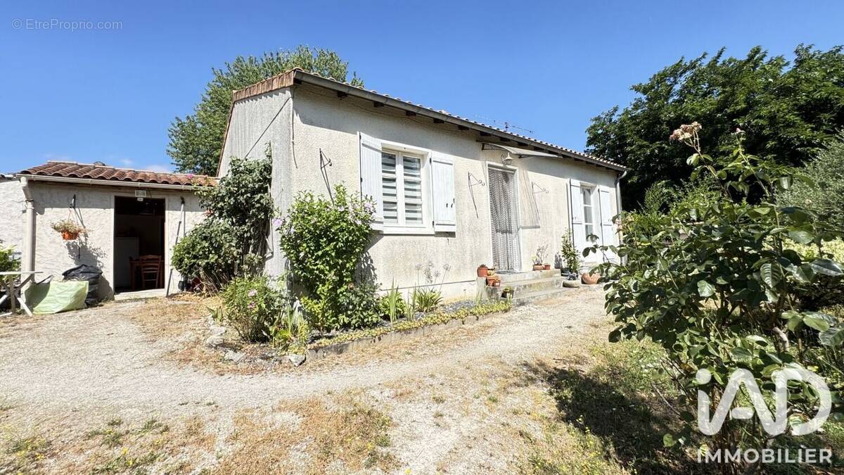 Photo 1 - Maison à ASNIERES-SUR-NOUERE