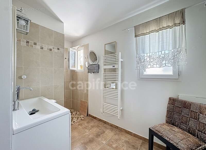 Maison de 100 m² avec garage et jardin - Beauvoisin - photo 12