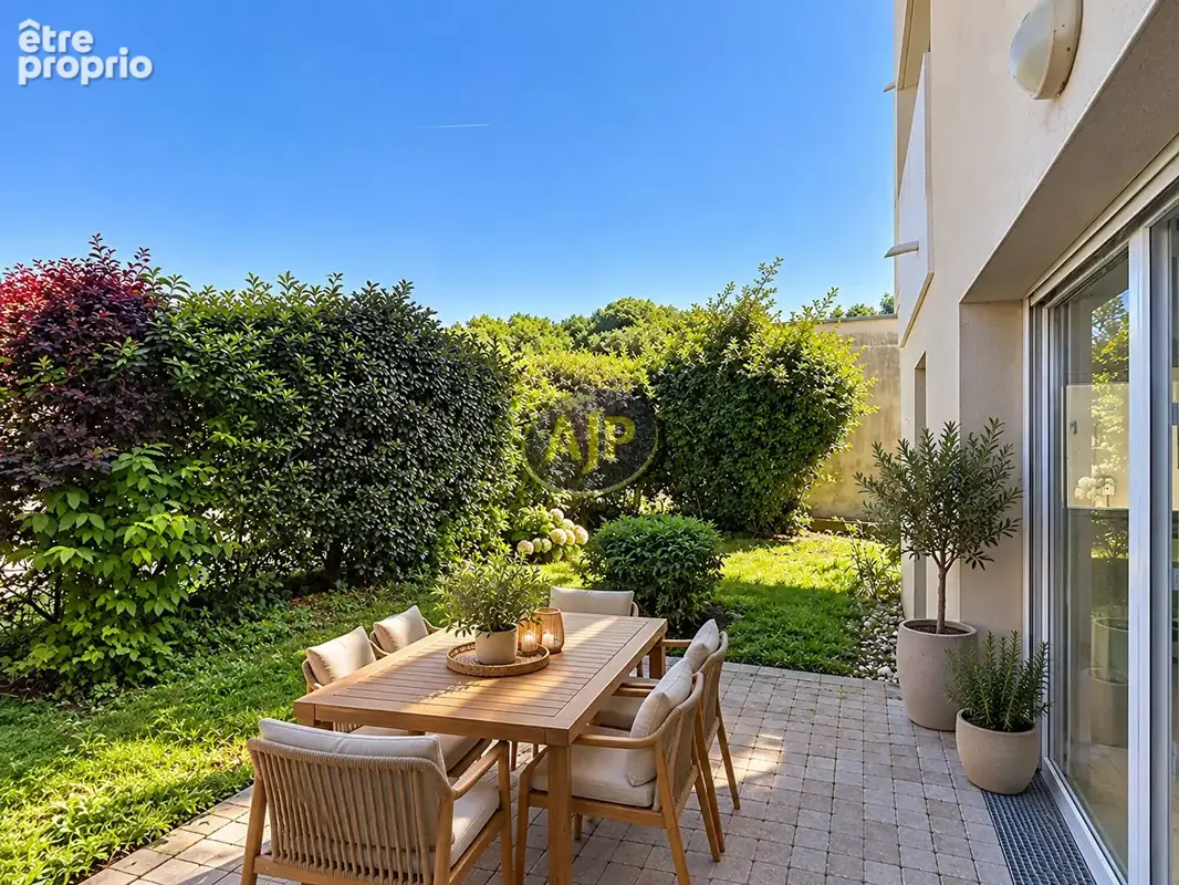 Appartement T4 avec terrasse et jardin - photo 3