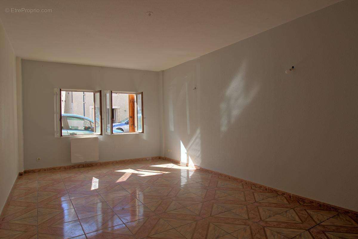 Immeuble de rapport avec 2 appartements et une maison - photo 10