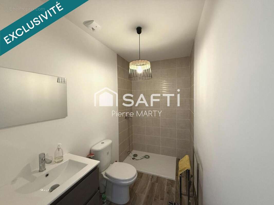 Maison 94 m² à Sougeal  - photo 4