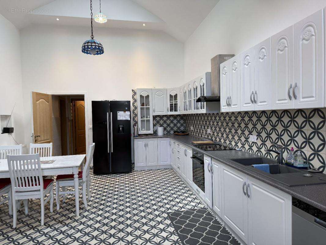 Maison à CASTELNAU-D'AUZAN