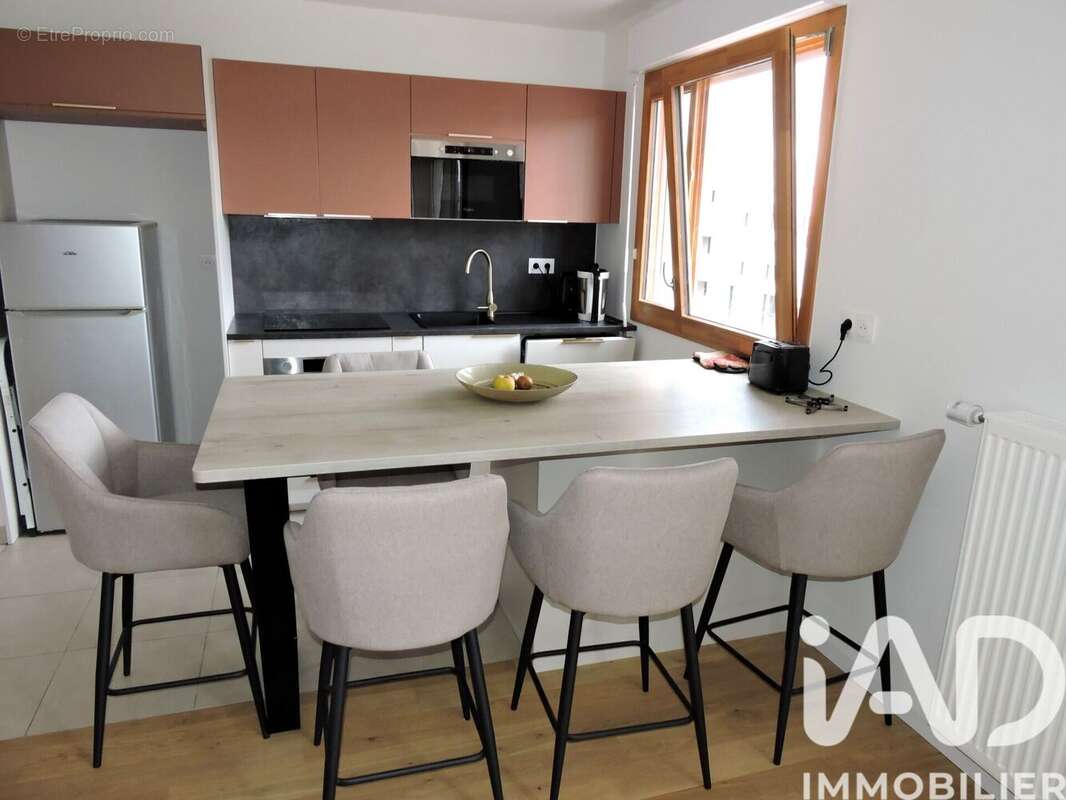 Photo 4 - Appartement à VOISINS-LE-BRETONNEUX