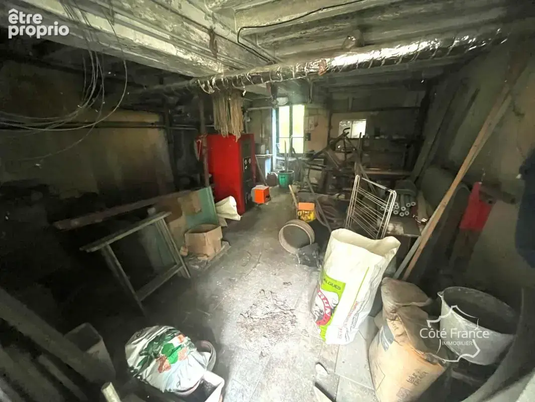 Maison à rénover avec grand garage et un jardin de 100m2 - photo 11
