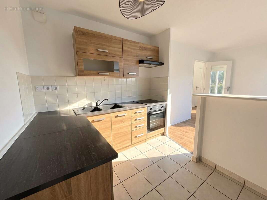 Appartement 56 m² à Chartres-De-Bretagne  - photo 6