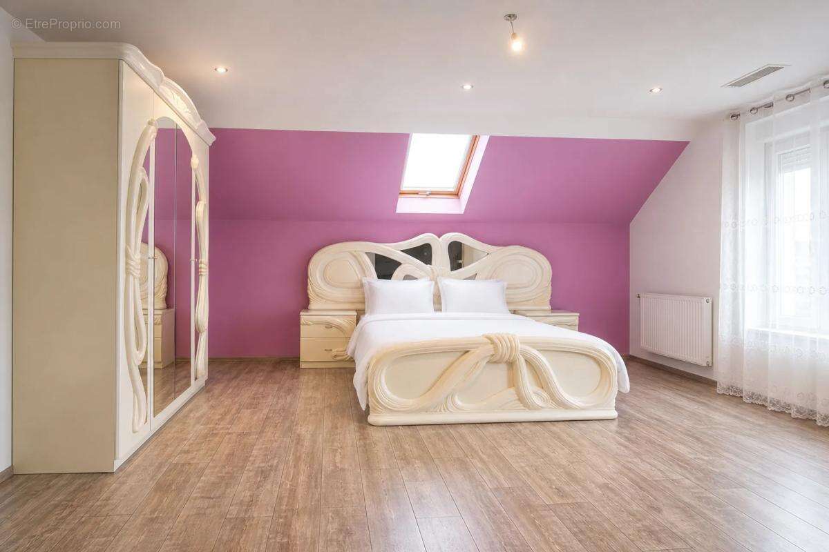 Immeuble rénové avec 3 appartements à Mulhouse - photo 14