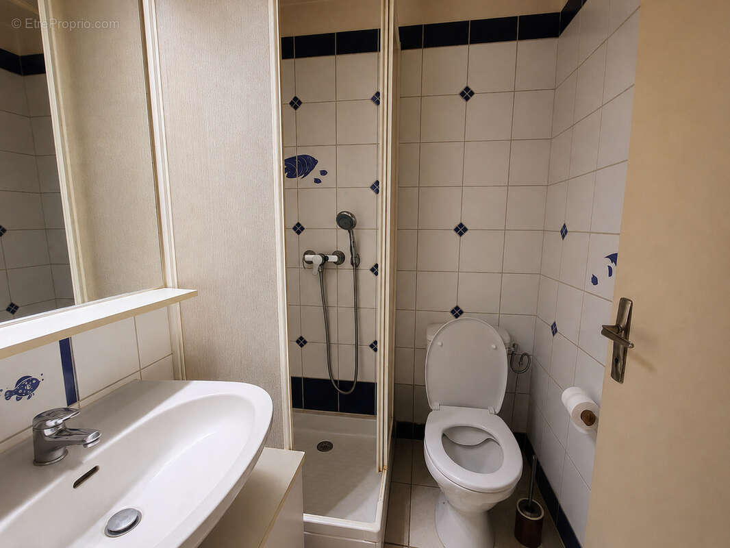 Appartement  de type 2 en rez de jardin - photo 2