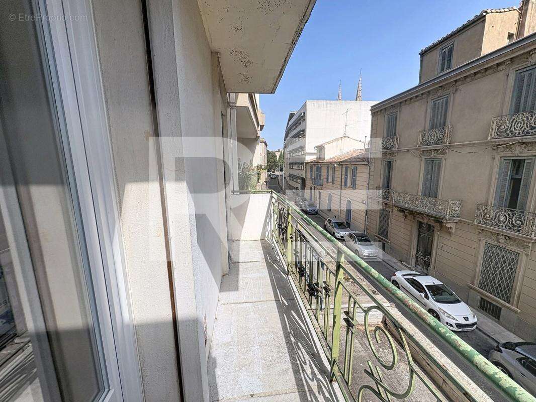 Nîmes centre - quartier st baudile - appartement traversant type t3 de 74 m2 avec cave et garage - photo 11