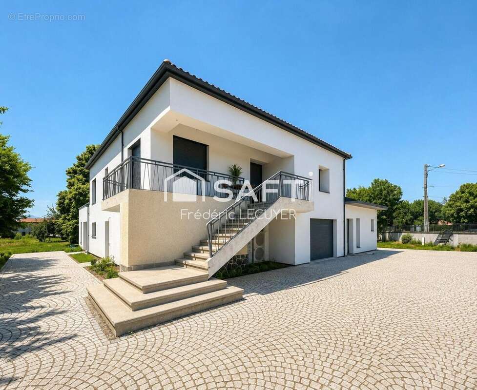 Photo 2 - Maison à SAINT-BEAUZIRE
