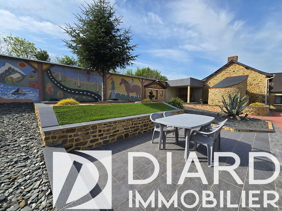 Maison à DOMALAIN
