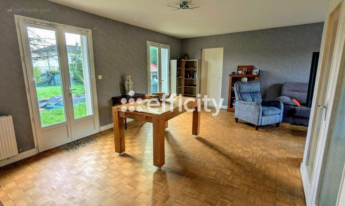 Maison 93 m² à L'isle-D'espagnac  - photo 2