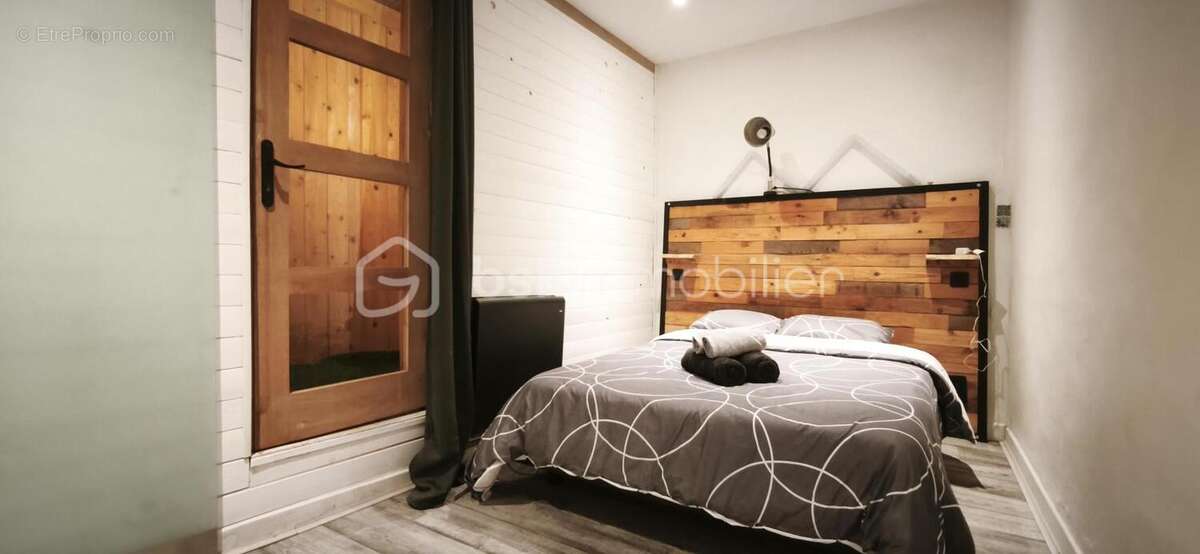 Investissement locatif- un local commercial- 2 appartements- 1 studio - 1 cave- entièrement meublé - photo 15