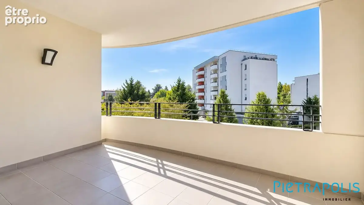 Appartement 4 pièces 110 m² à vendre à Saint-Genis-Pouilly (01630) - photo 4