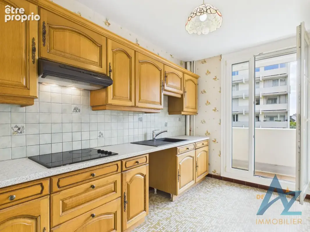 Appartement à deux pas des commerces - photo 1