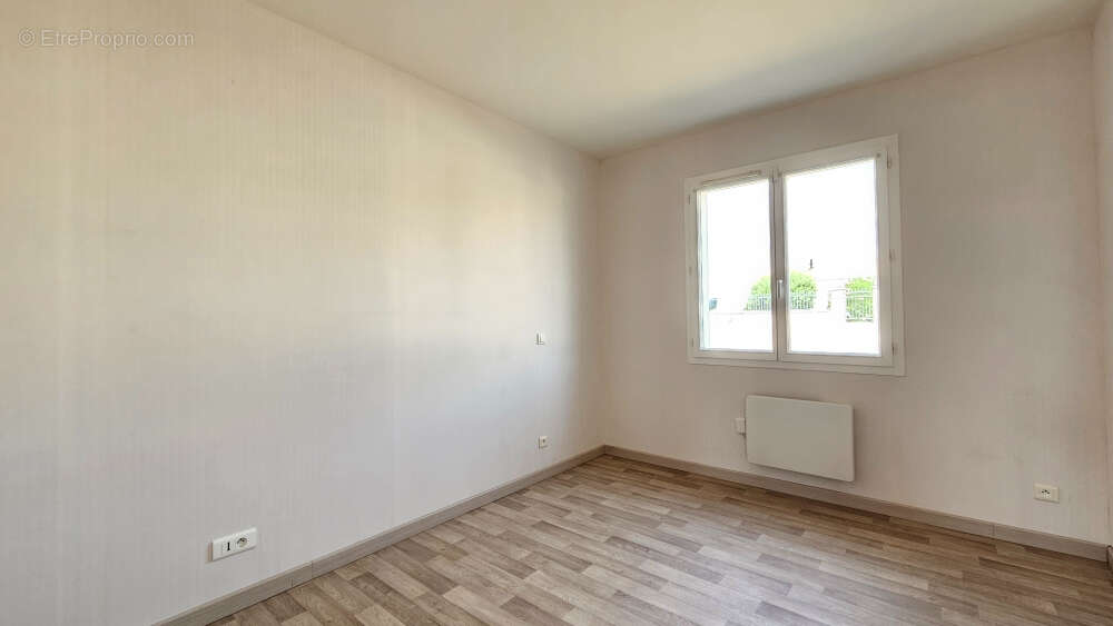 Maison 90 m² à Echire  - photo 6
