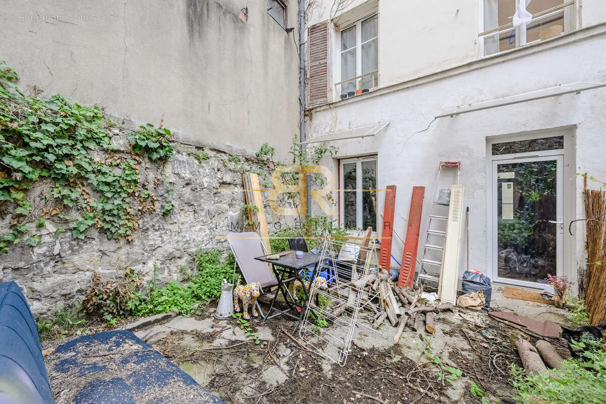 Calme / jardin 35m2 / belle hauteur sous plafond - photo 7