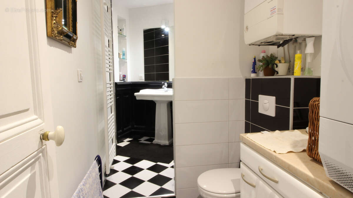 Bel appartement T2 avec ascenseur en centre-ville de Vichy avec cave et mansarde - photo 14