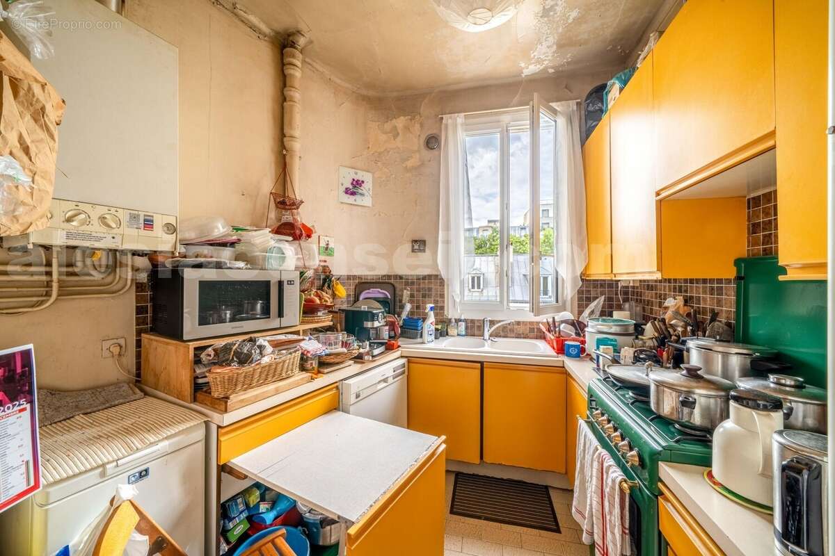 Photo n°3 - Appartement à PARIS-14E