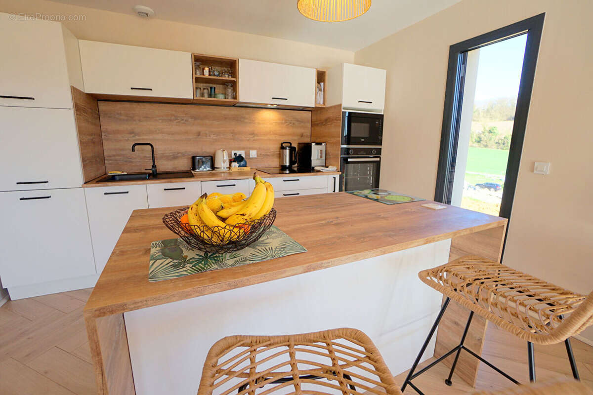 Maison à AUBERGENVILLE