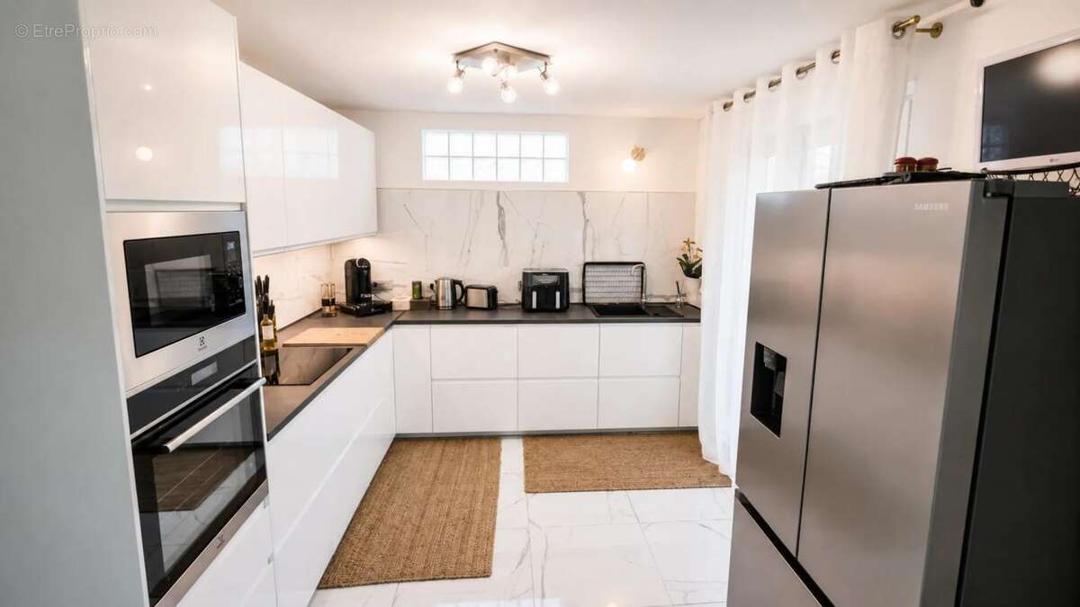 Maison de 7 pièces de 140 m² à Clichy-sous-Bois - photo 5
