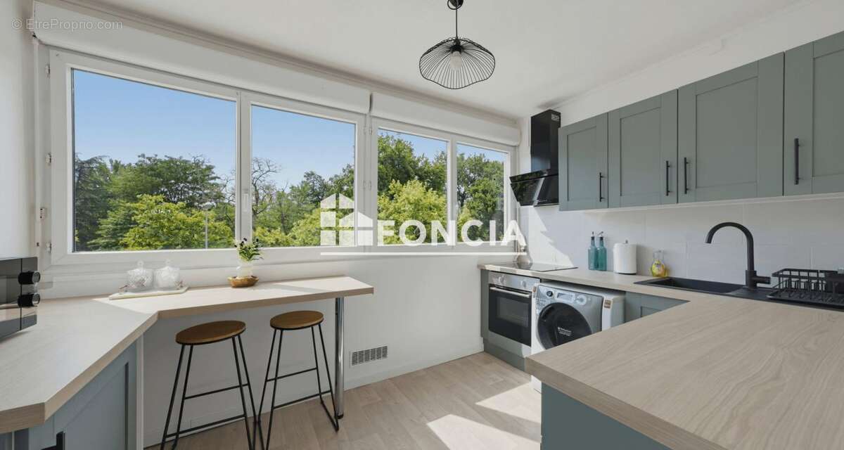 Appartement type 4 renove proche tram b - photo 7
