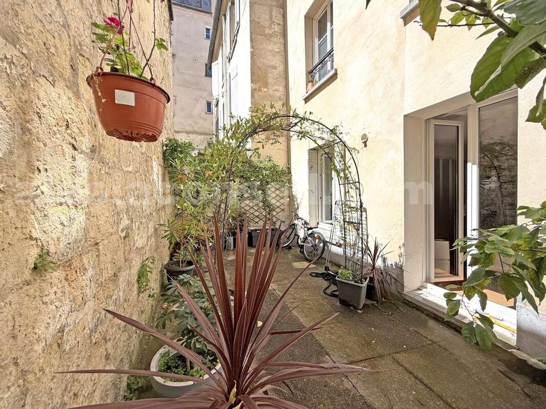 beau35-floc-cour - Appartement à PARIS-14E