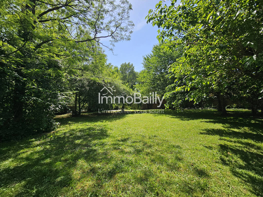 Maison familiale de plain-pied   5 chambres   Terrain de 1 672 m2  en lisière de forêt - photo 11