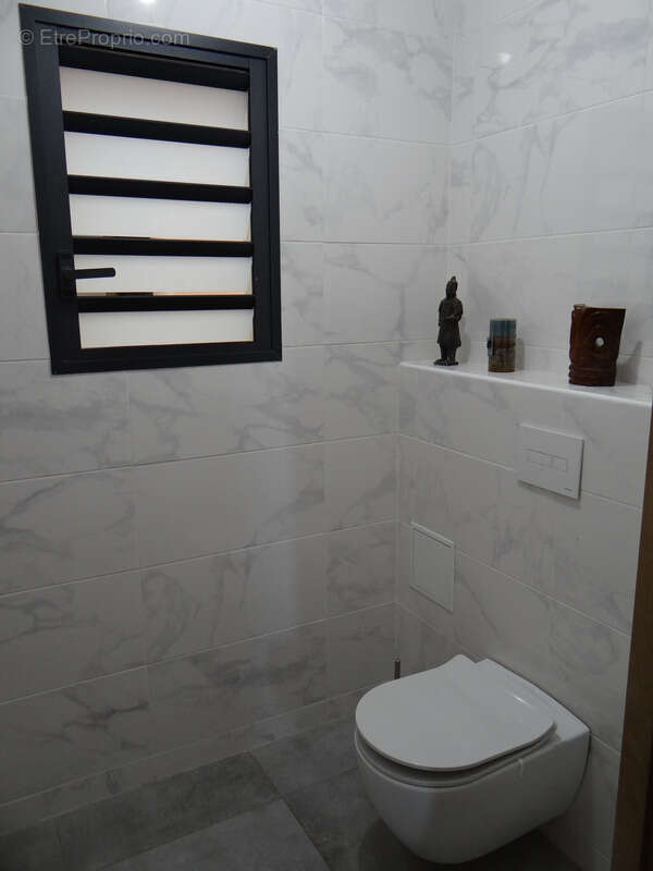 Appartement T3 d'exception de 80m2 vue océan SAINT GILLES LES BAINS (974) - photo 12