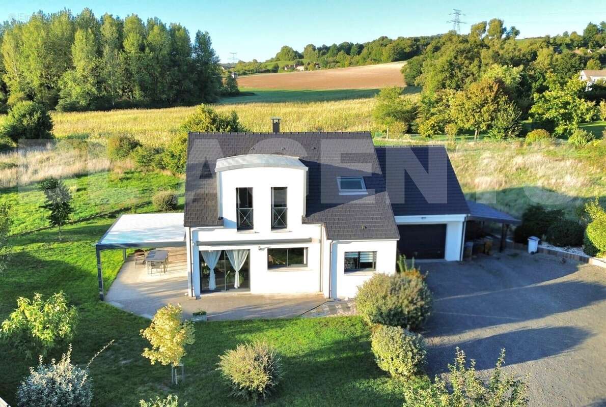 PHOTO  - Maison à ECOMMOY