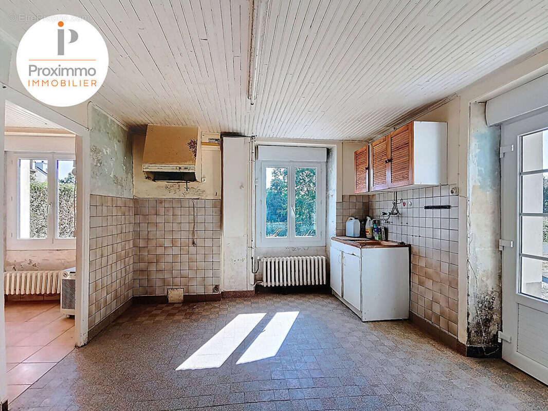 Maison a renover avec beau potentiel - photo 4