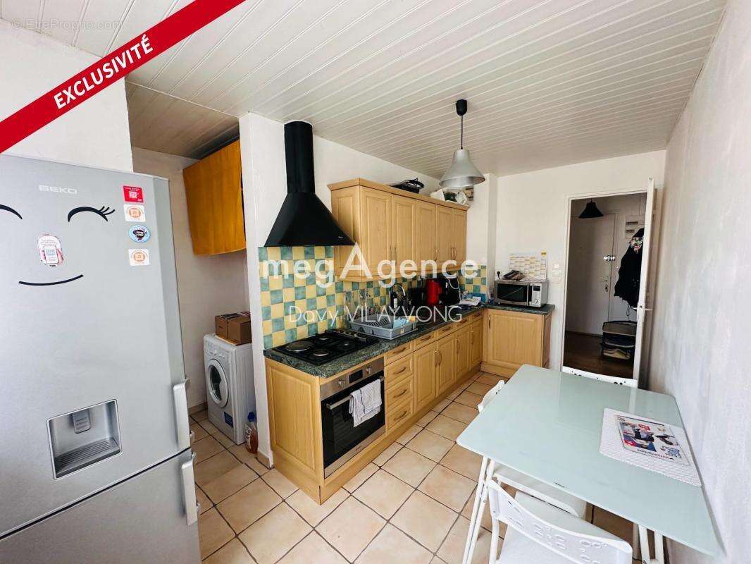 Appartement t3 + cave + parking - photo 5